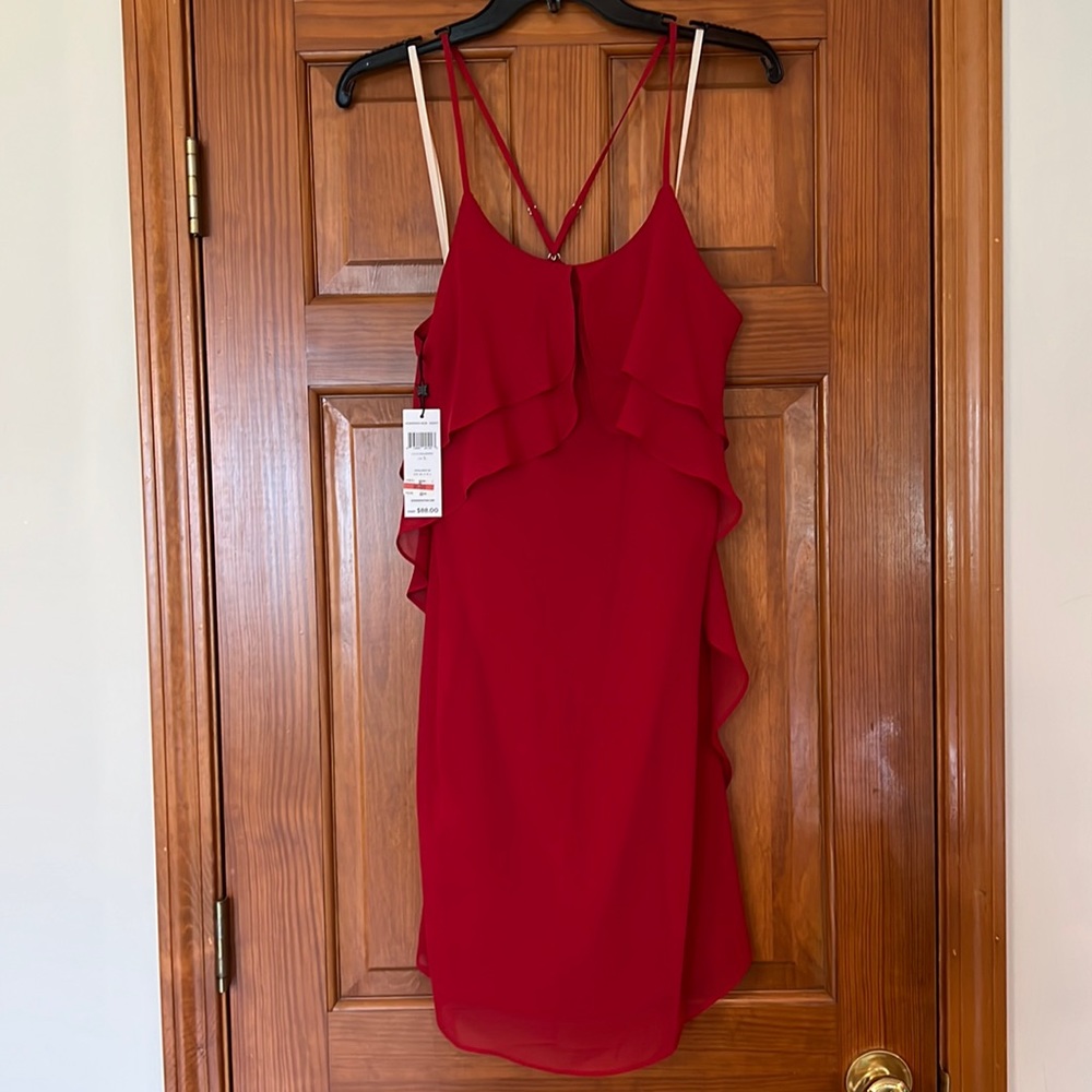 NWT. Women’s red BCBGeneration ruffle front dress. Size large. Smoke free.